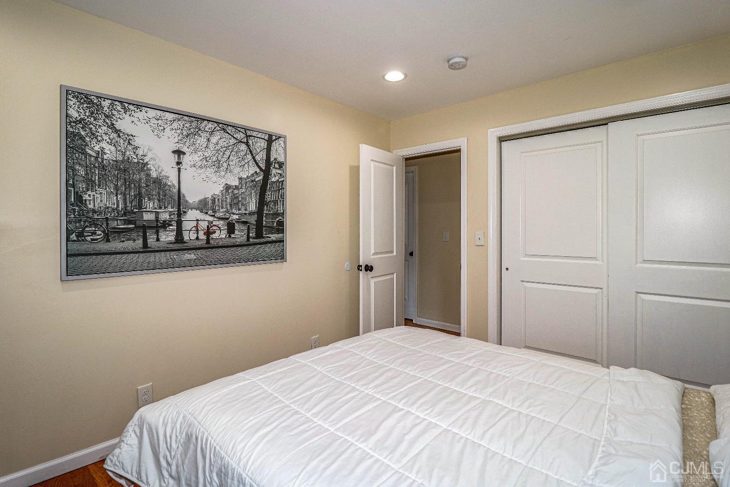 198 Carter Road Princeton, NJ 08540 - Photo 17 of 38 a bedroom with a bed and wall painting