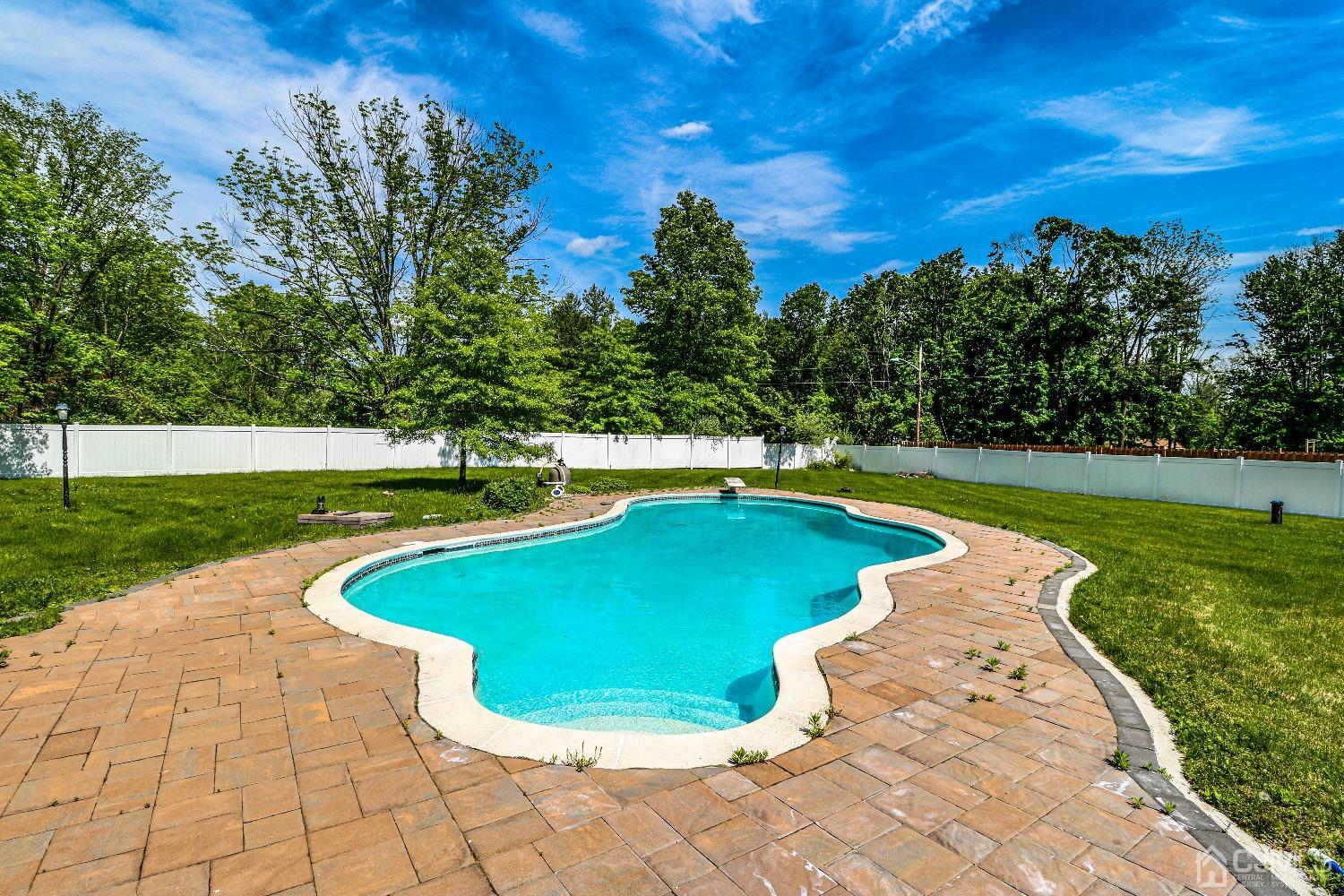 198 Carter Road Princeton, NJ 08540 - Photo 4 of 38 a view of a swimming pool with a yard