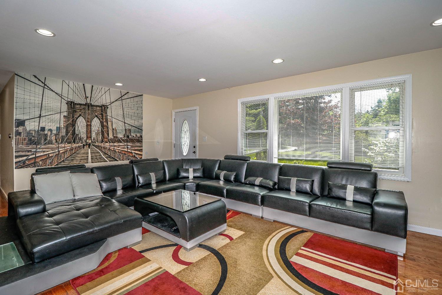 198 Carter Road Princeton, NJ 08540 - Photo 8 of 38 a living room with furniture and a floor to ceiling window
