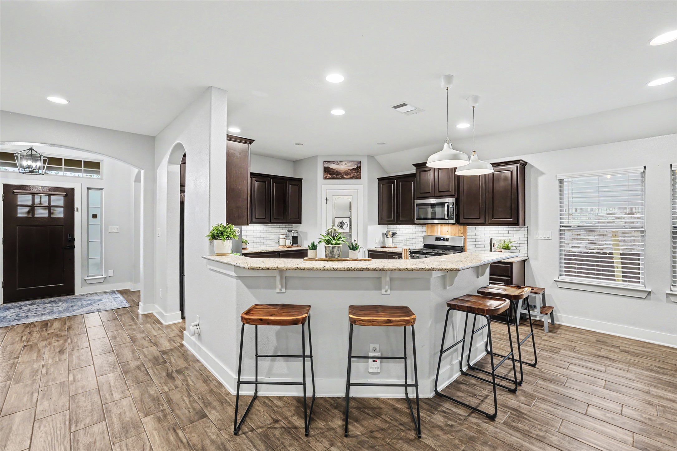 117 Rock Dock Road Georgetown, TX 78633 - Photo 11 of 38 a kitchen with a table and chairs in it