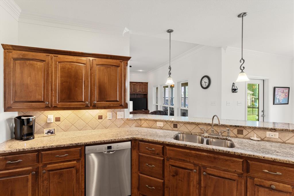 345 Rains County Road 3390 Emory, TX 75440 - Photo 14 of 39 a kitchen with a sink and cabinets