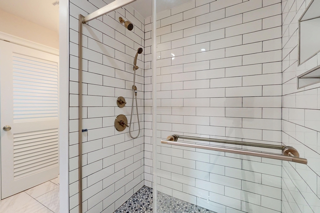61 Charlotte Street, Unit 2 Boston, MA 02121 - Photo 15 of 36 a bathroom with a shower