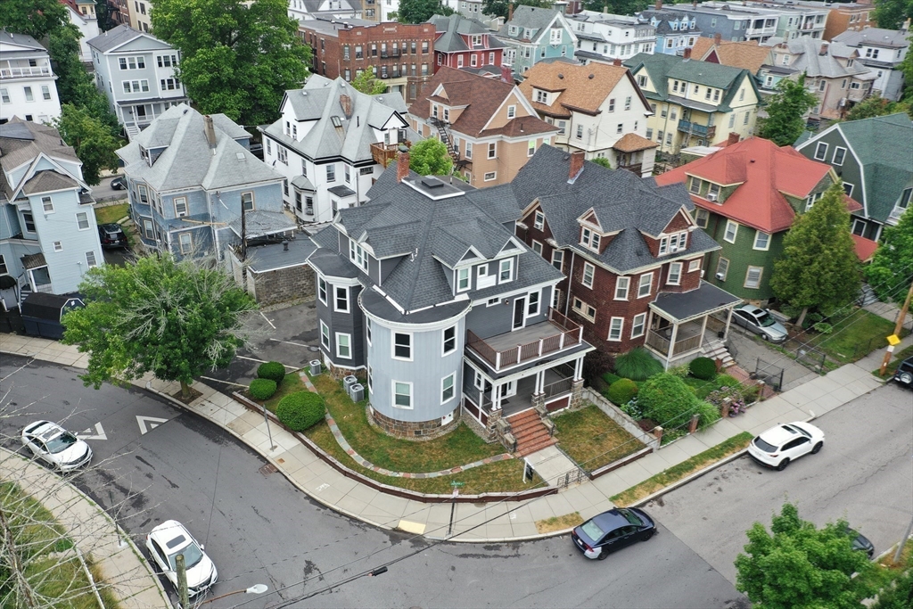 61 Charlotte Street, Unit 2 Boston, MA 02121 - Photo 32 of 36 an aerial view of residential house with outdoor space and parking