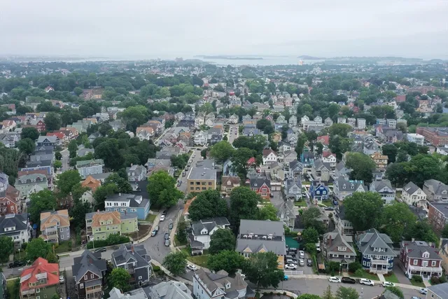 an aerial view of a city with lots of residential buildings