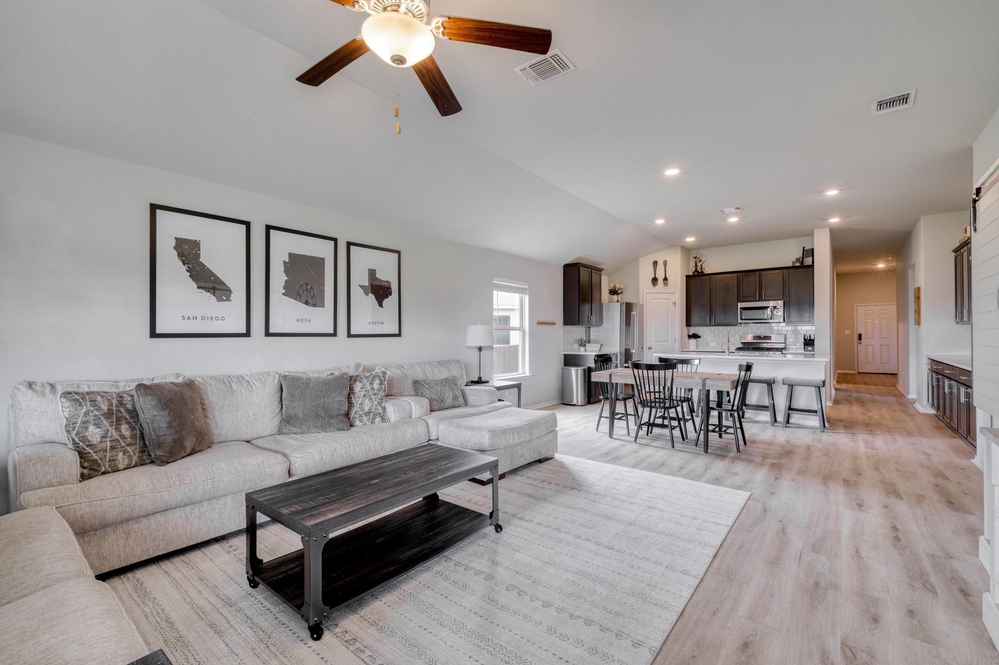 1000 Bright Star Cove Georgetown, TX 78628 - Photo 14 of 40 a living room with furniture and wooden floor
