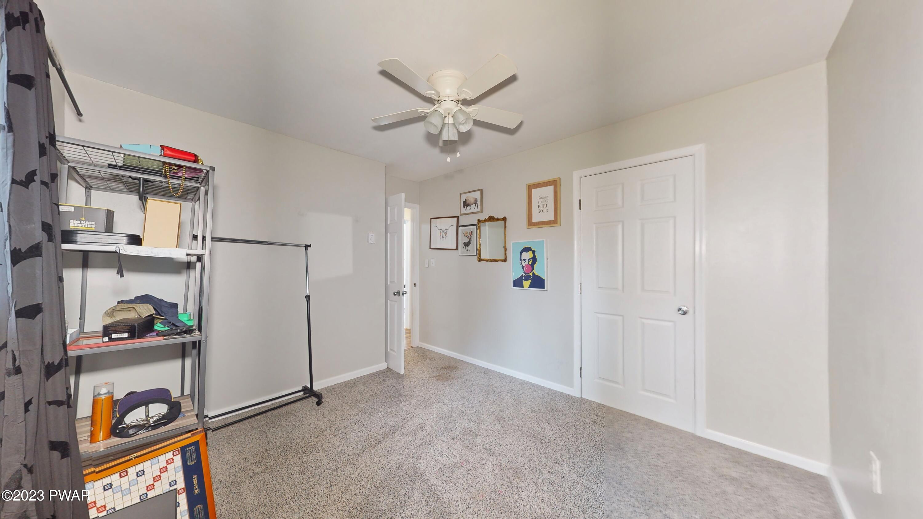 149 Walker Lake Road Shohola, PA 18458 - Photo 19 of 51 a view of a hallway with workspace and entryway