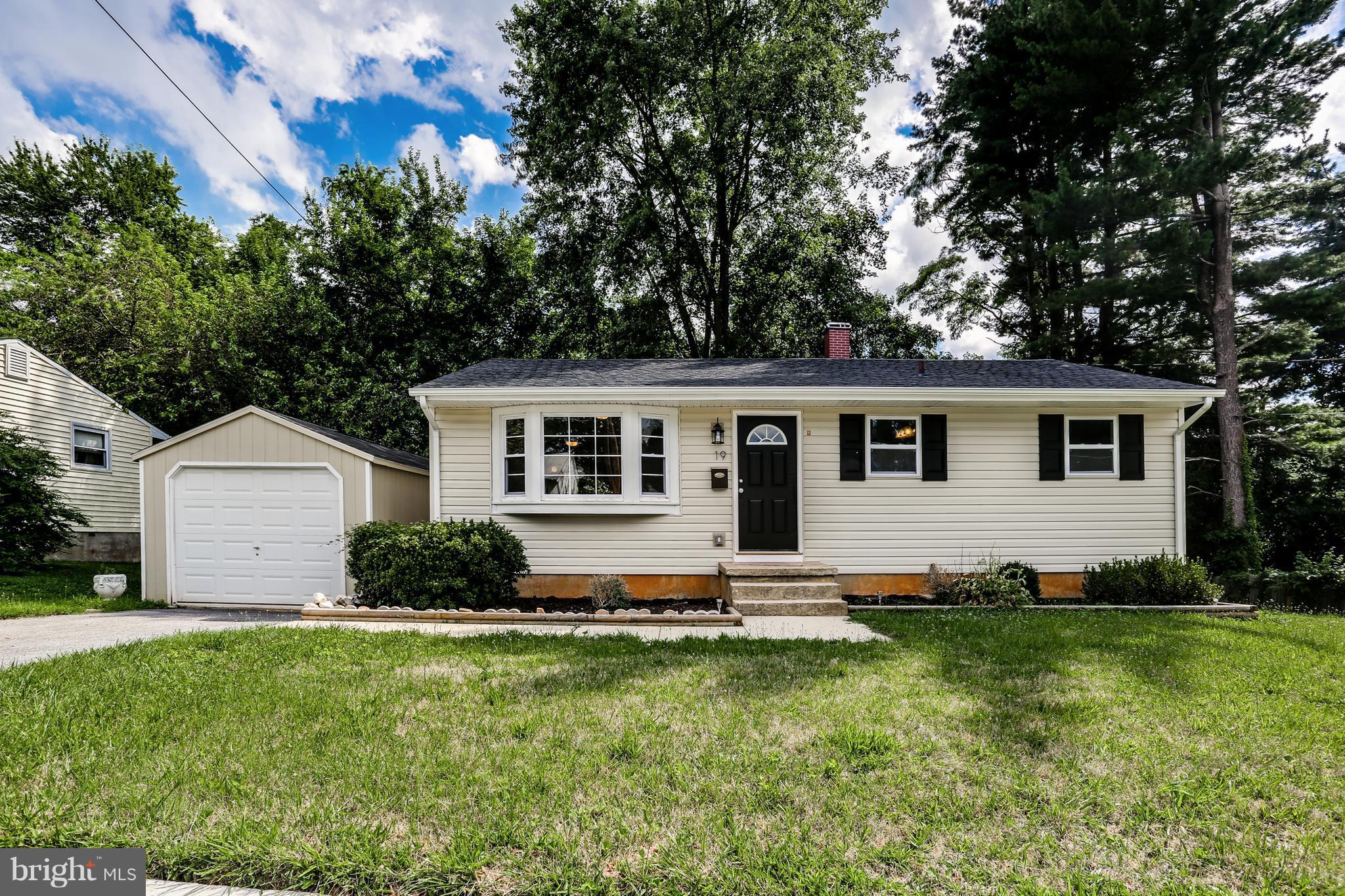 19 Millgate Road Owings Mills, MD 21117 - Photo 1 of 30 a front view of a house with a yard
