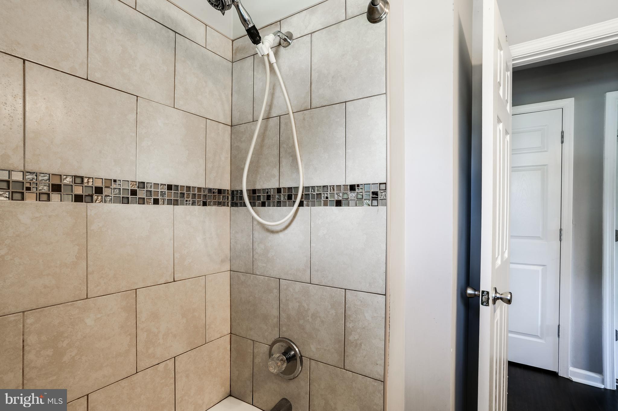 19 Millgate Road Owings Mills, MD 21117 - Photo 18 of 30 a bathroom with a shower and a shower