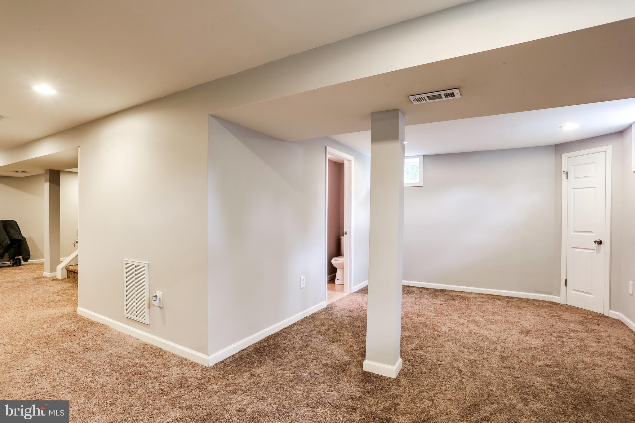 19 Millgate Road Owings Mills, MD 21117 - Photo 22 of 30 a view of a livingroom with an empty space