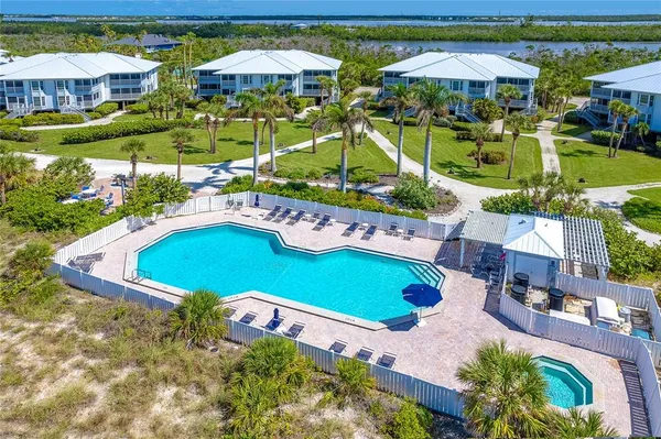 a view of a swimming pool with a patio
