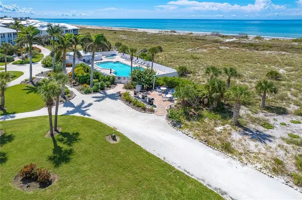 a view of swimming pool from a balcony