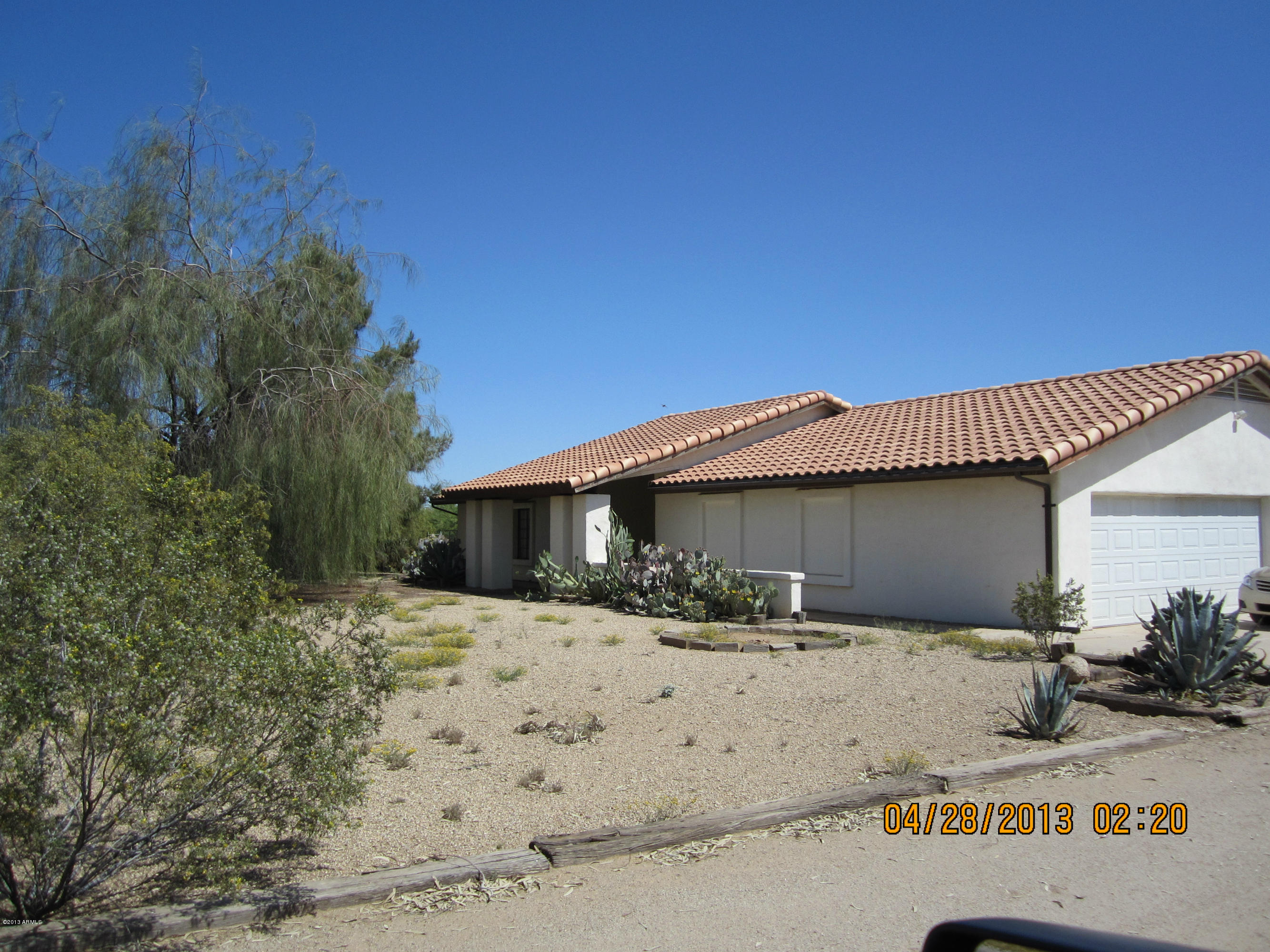 731 East Maddock Road Phoenix, AZ 85086 - Photo 1 of 19 a view of a house with a patio