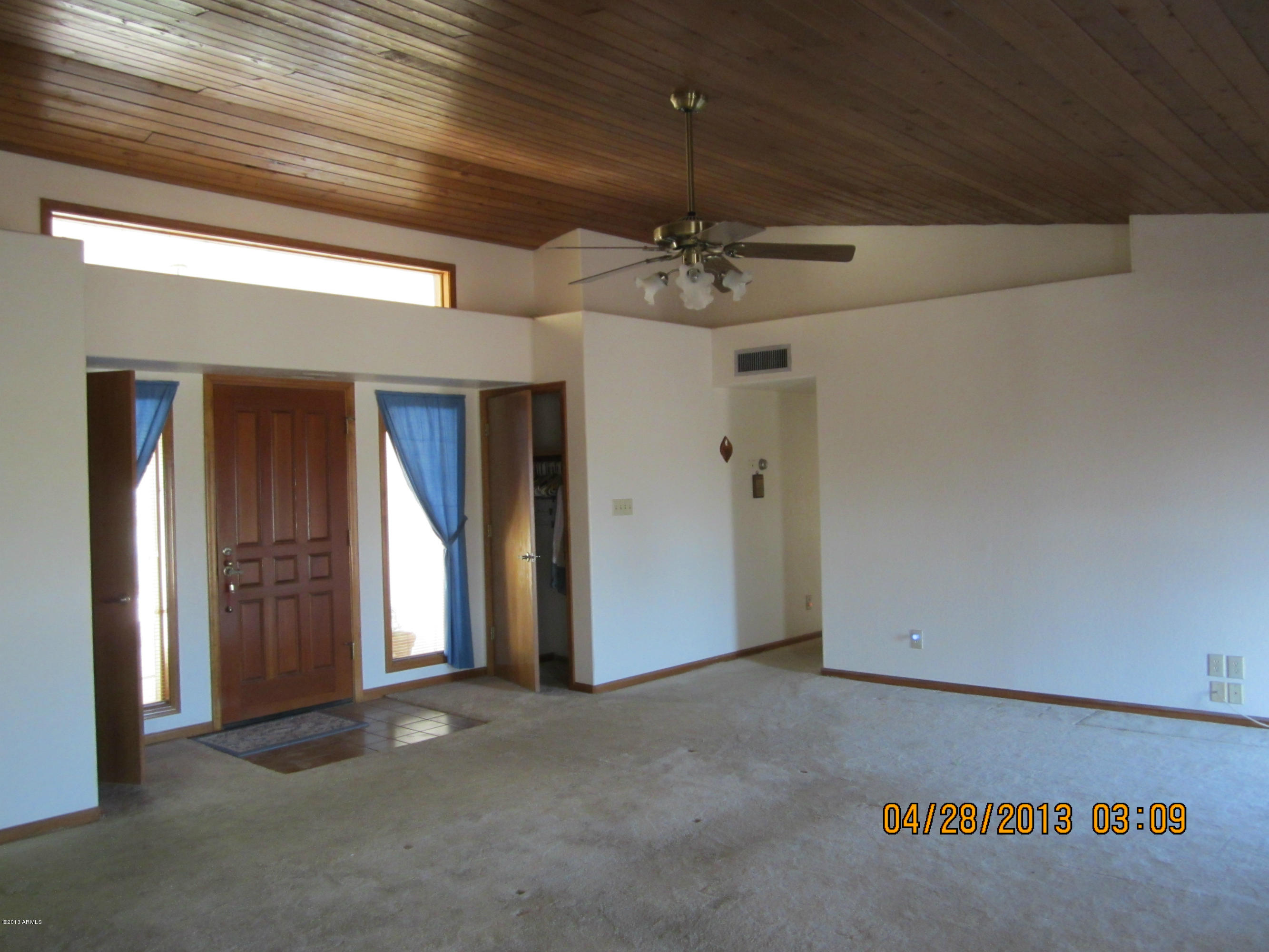 731 East Maddock Road Phoenix, AZ 85086 - Photo 6 of 19 a view of a hallway with a ceiling fan