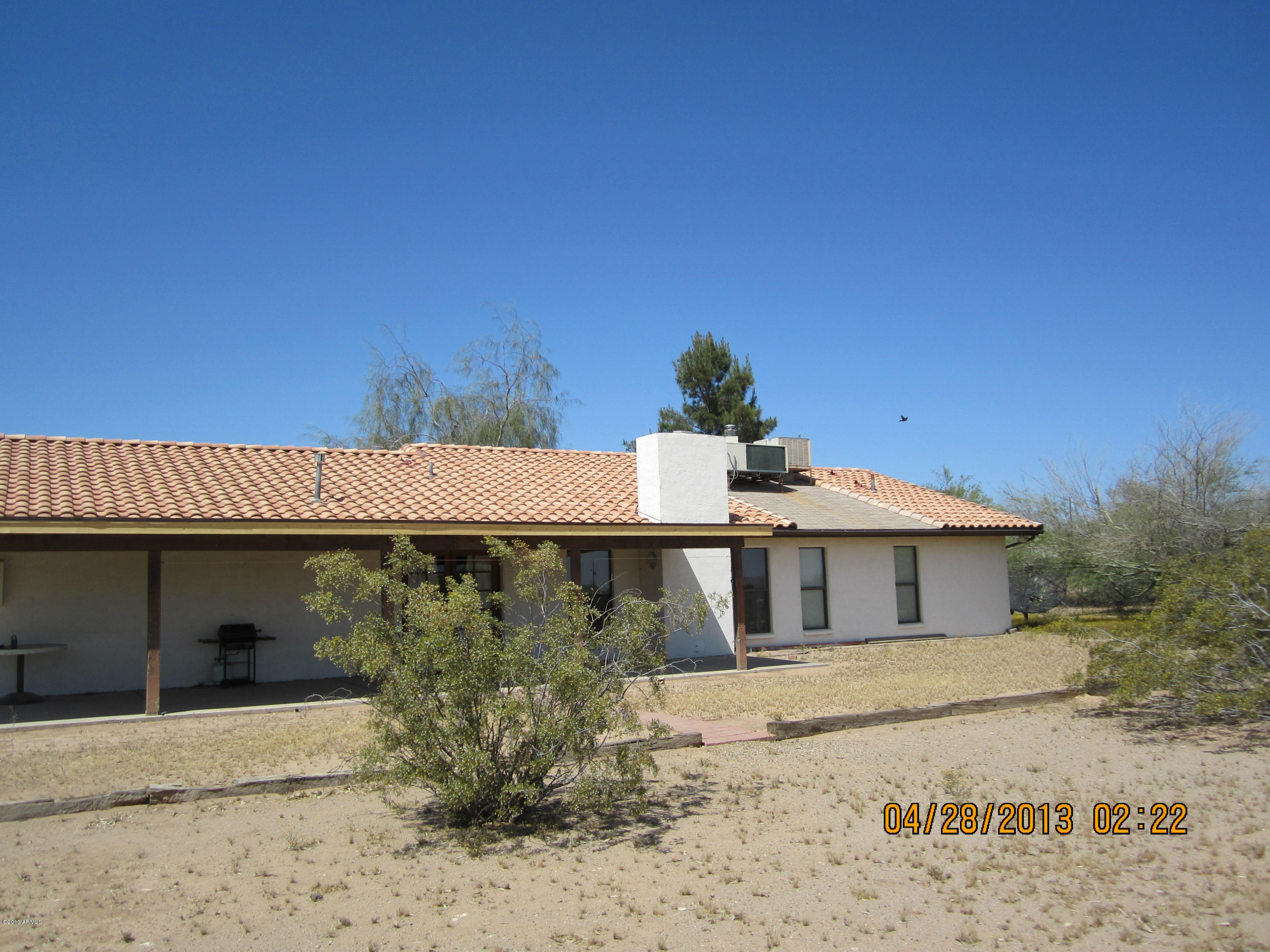 731 East Maddock Road Phoenix, AZ 85086 - Photo 10 of 19 a front view of a house with a garden