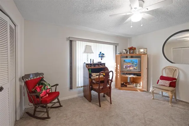 a room with furniture and musical instruments