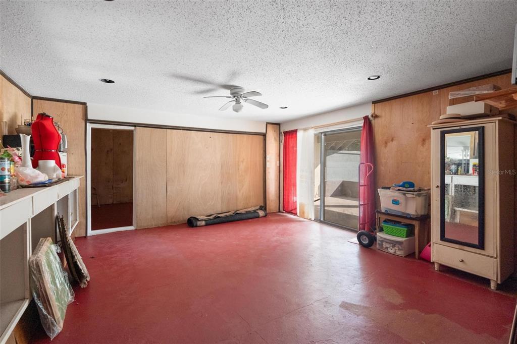 1245 Curlew Road Dunedin, FL 34698 - Photo 29 of 42 a view of an empty room with window and closet