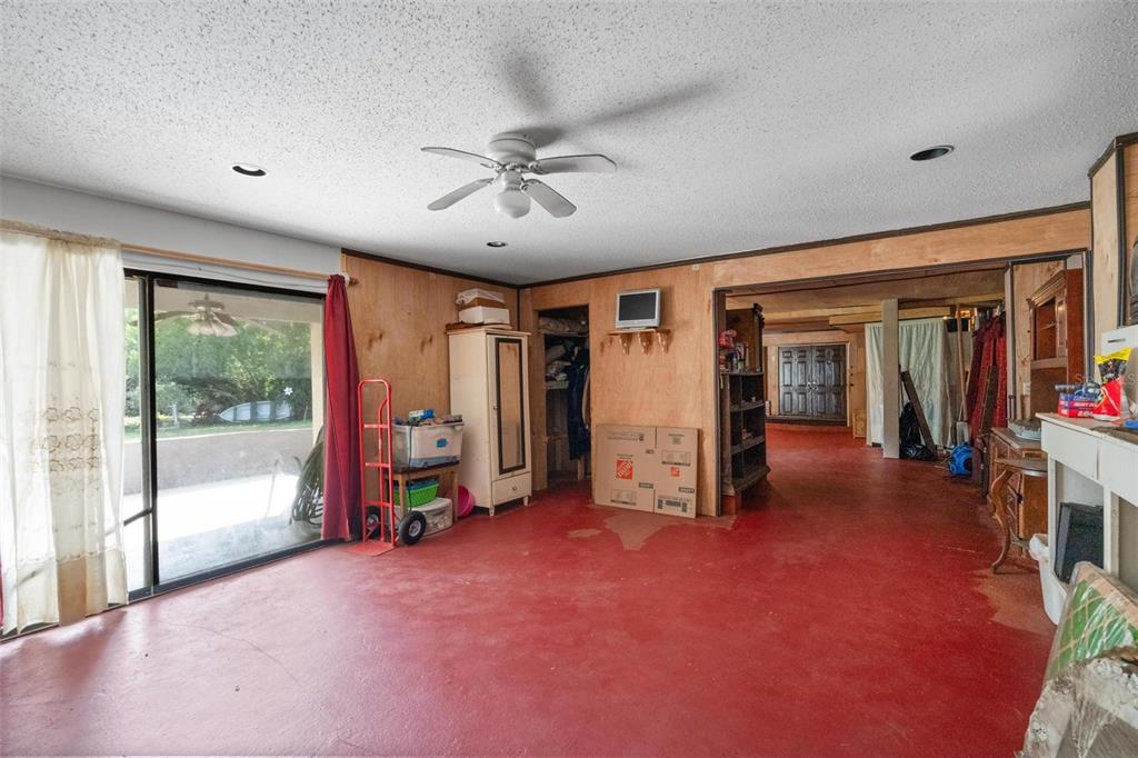 1245 Curlew Road Dunedin, FL 34698 - Photo 30 of 42 a view of a room with gym equipment