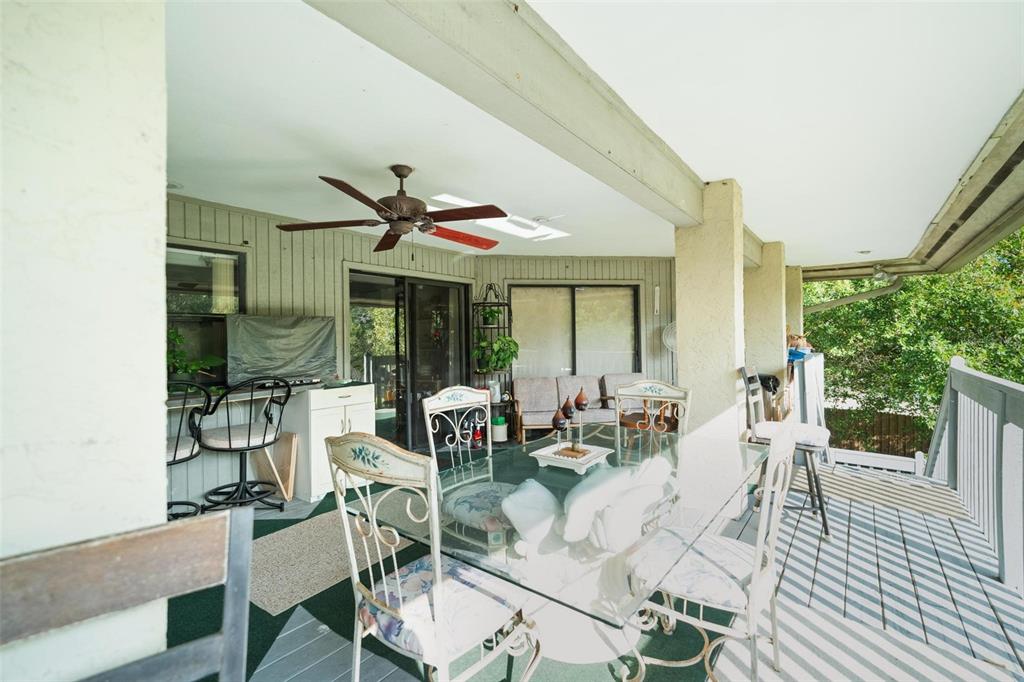 1245 Curlew Road Dunedin, FL 34698 - Photo 32 of 42 a living room with furniture