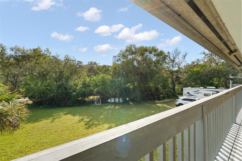 1245 Curlew Road Dunedin, FL 34698 - Photo 36 of 42 a view of a lake from a balcony