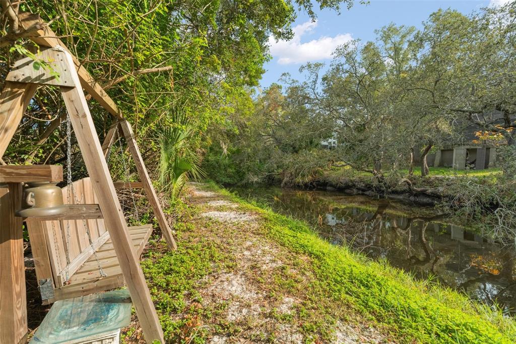 1245 Curlew Road Dunedin, FL 34698 - Photo 39 of 42 a view of swimming pool with a yard