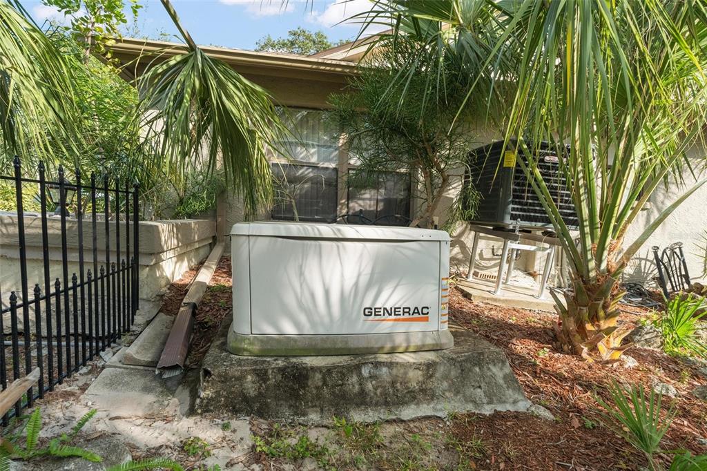 1245 Curlew Road Dunedin, FL 34698 - Photo 40 of 42 a view of outdoor space with a garden