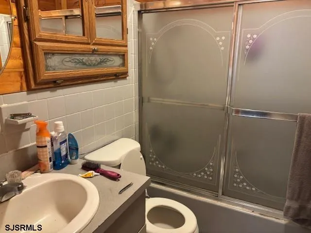a bathroom with a sink and a shower
