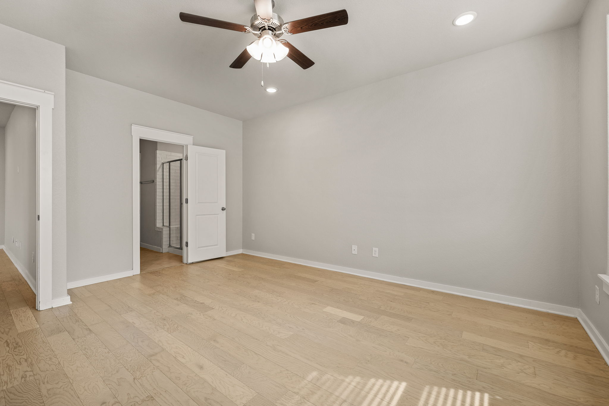 2233 Calvert Drive Leander, TX 78641 - Photo 15 of 32 The primary suite is complete with an ensuite bath.