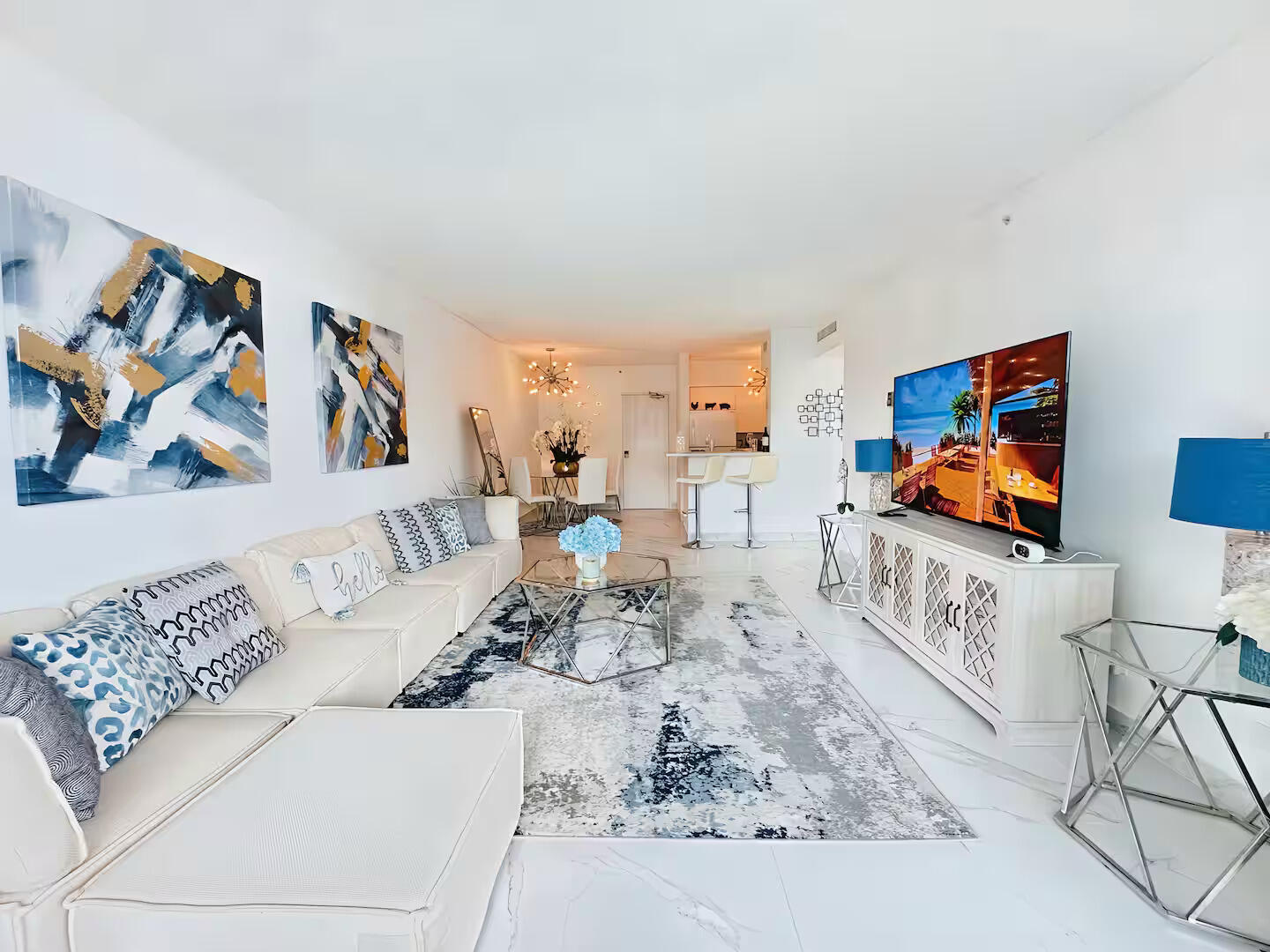 1500 Bay Road, Unit 1244S Miami Beach, FL 33139 - Photo 12 of 48 a living room with furniture and a flat screen tv