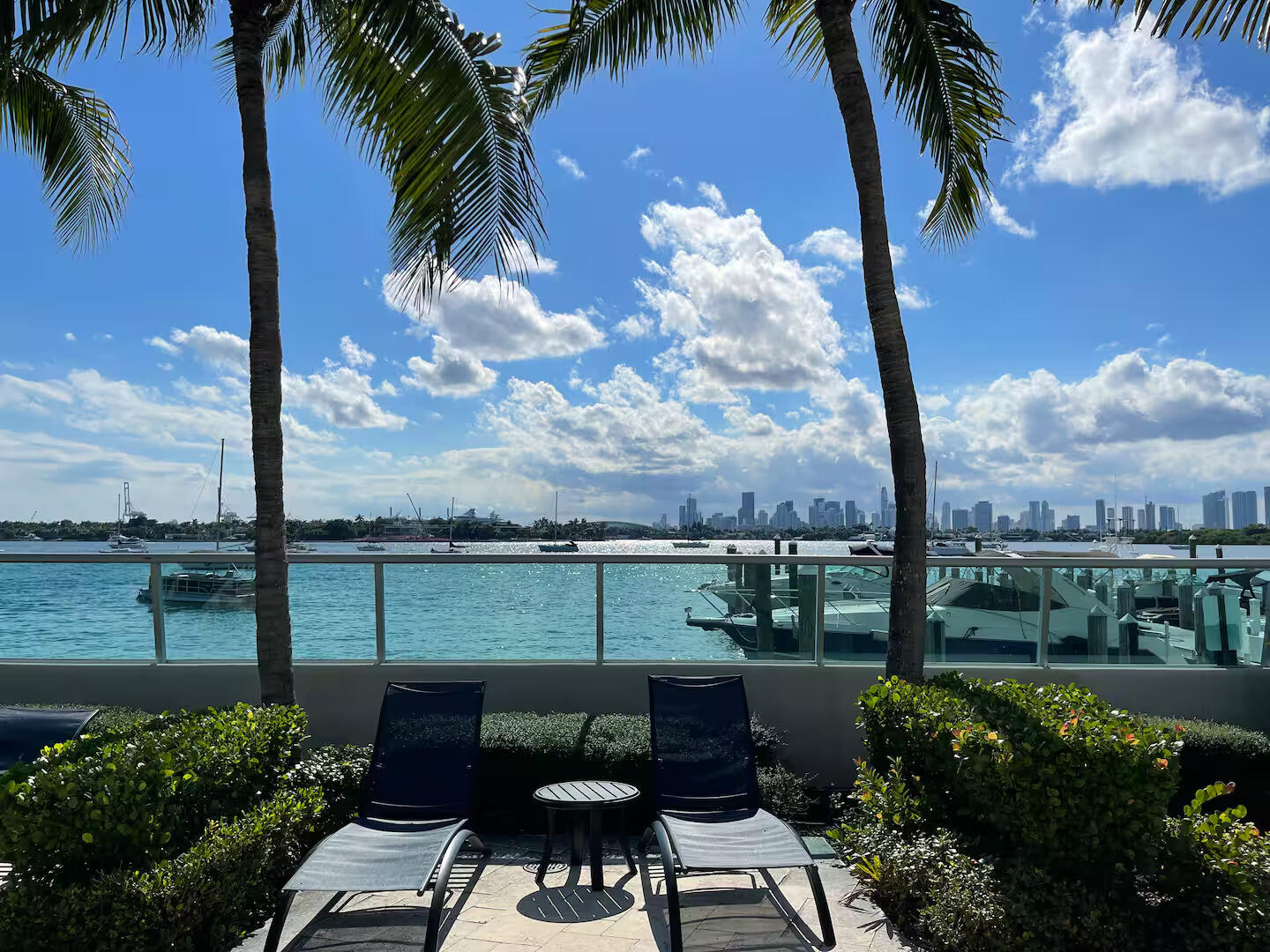 1500 Bay Road, Unit 1244S Miami Beach, FL 33139 - Photo 24 of 48 a view of a yard with furniture and a table