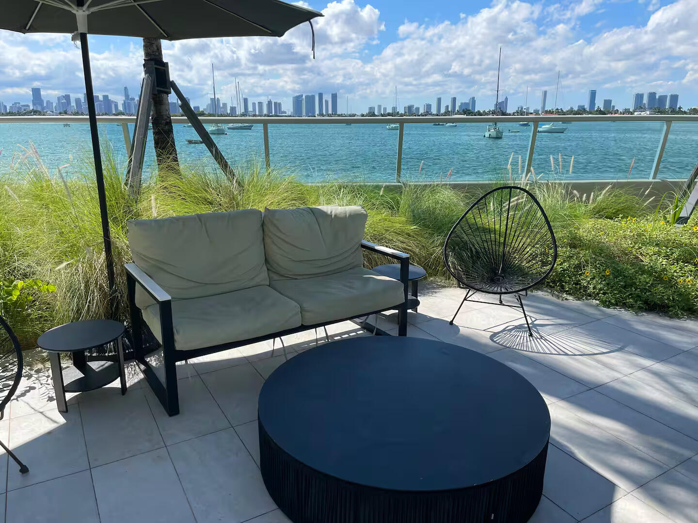 1500 Bay Road, Unit 1244S Miami Beach, FL 33139 - Photo 44 of 48 an outdoor living room with furniture