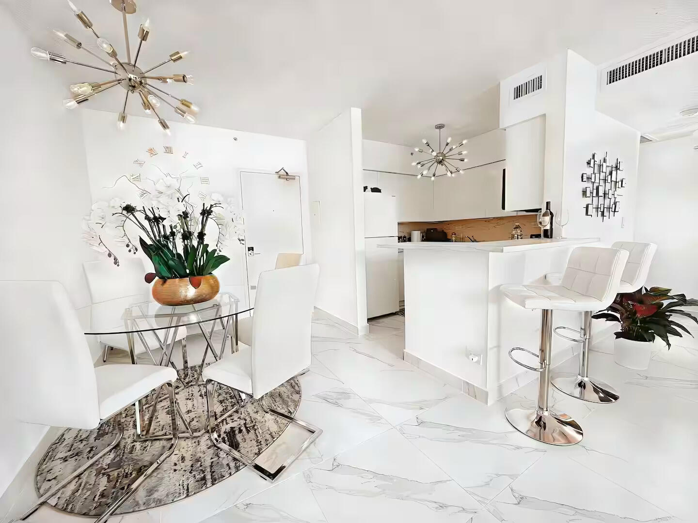 1500 Bay Road, Unit 1244S Miami Beach, FL 33139 - Photo 7 of 48 a view of a living room and a chandelier