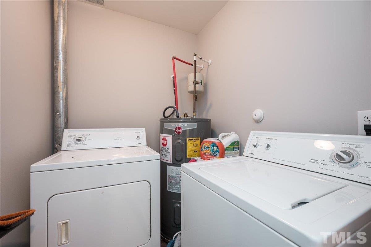 2210 Raven Road, Unit 108 Raleigh, NC 27614 - Photo 15 of 22 a utility room with dryer and washer