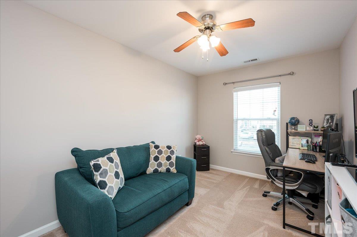 2210 Raven Road, Unit 108 Raleigh, NC 27614 - Photo 18 of 22 a living room with furniture