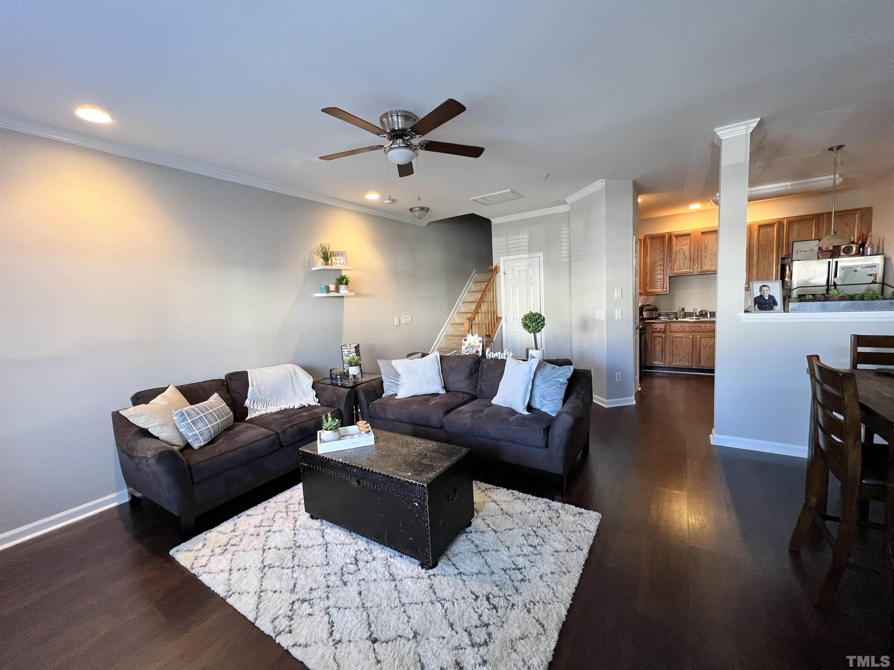 2210 Raven Road, Unit 108 Raleigh, NC 27614 - Photo 2 of 22 a living room with furniture and a large window