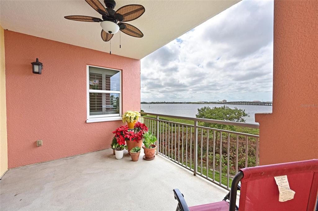 615 Riviera Dunes Way, Unit 107 Palmetto, FL 34221 - Photo 24 of 50 a view of a porch with furniture