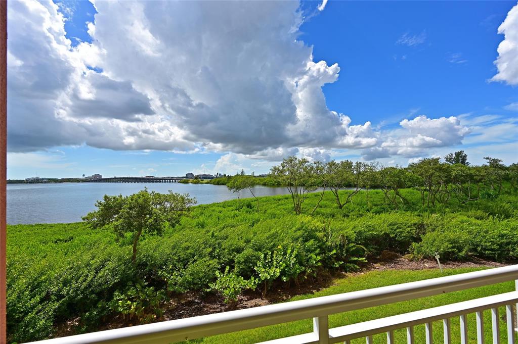 615 Riviera Dunes Way, Unit 107 Palmetto, FL 34221 - Photo 26 of 50 a view of a garden from a balcony