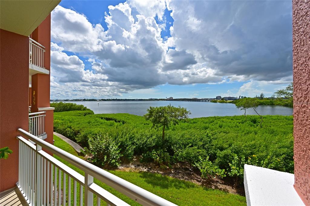 615 Riviera Dunes Way, Unit 107 Palmetto, FL 34221 - Photo 27 of 50 a view of a garden from a balcony