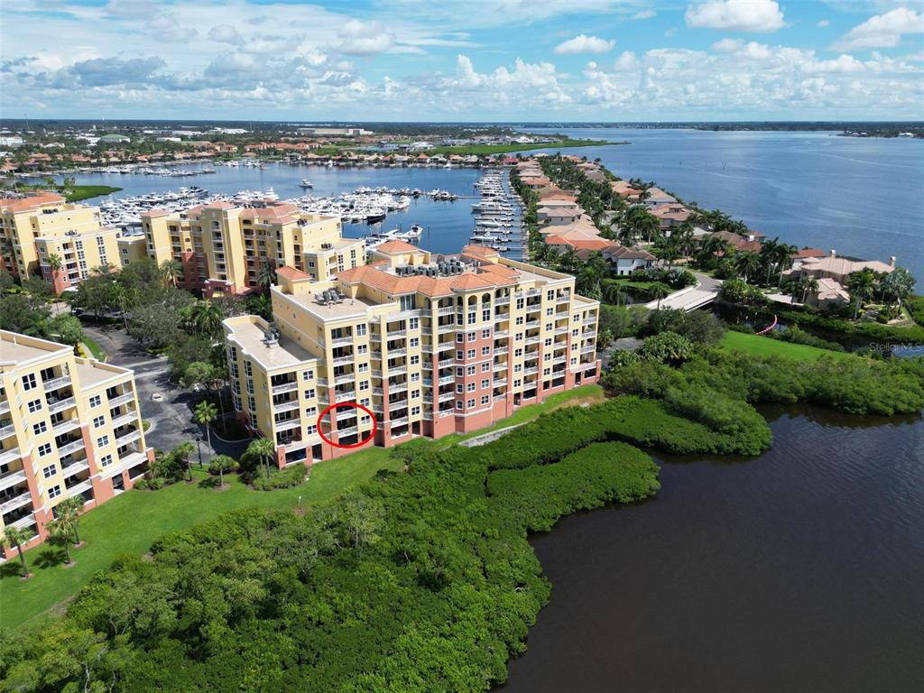 615 Riviera Dunes Way, Unit 107 Palmetto, FL 34221 - Photo 6 of 50 a view of a city with tall buildings