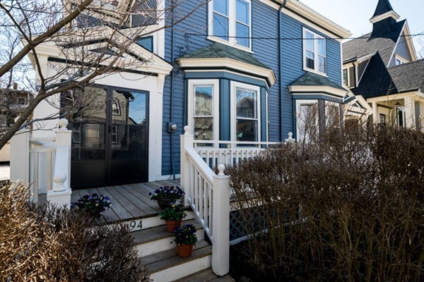94 Rockview Street Boston, MA 02130 - Photo 1 of 24 front view of a house with a small yard