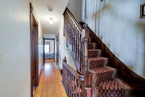 94 Rockview Street Boston, MA 02130 - Photo 13 of 24 a view of entryway with wooden floor
