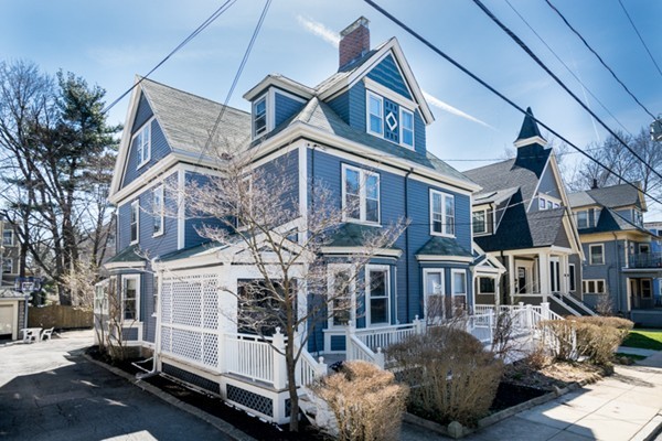94 Rockview Street Boston, MA 02130 - Photo 2 of 24 a front view of a residential apartment building with a yard