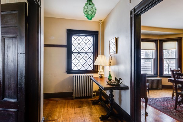 94 Rockview Street Boston, MA 02130 - Photo 4 of 24 a view of a livingroom with furniture and windows