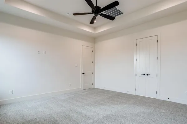 a bathroom with a sink double vanity and a mirror