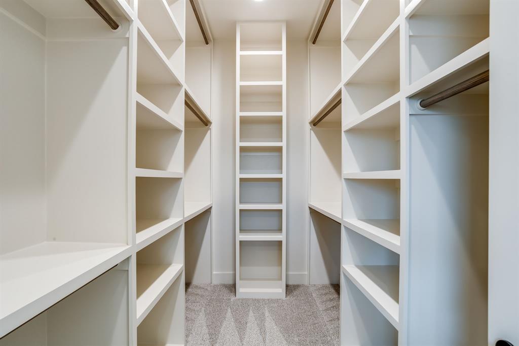 128 Prairie Winds Drive Poolville, TX 76487 - Photo 21 of 40 a view of walk in closet with empty racks