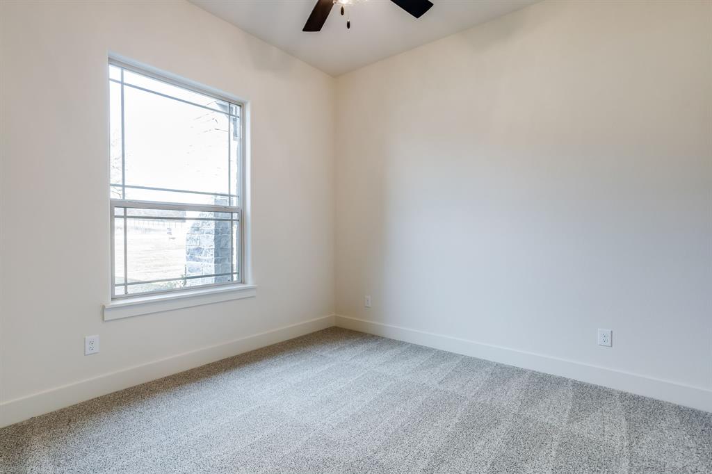 128 Prairie Winds Drive Poolville, TX 76487 - Photo 32 of 40 an empty room with a window