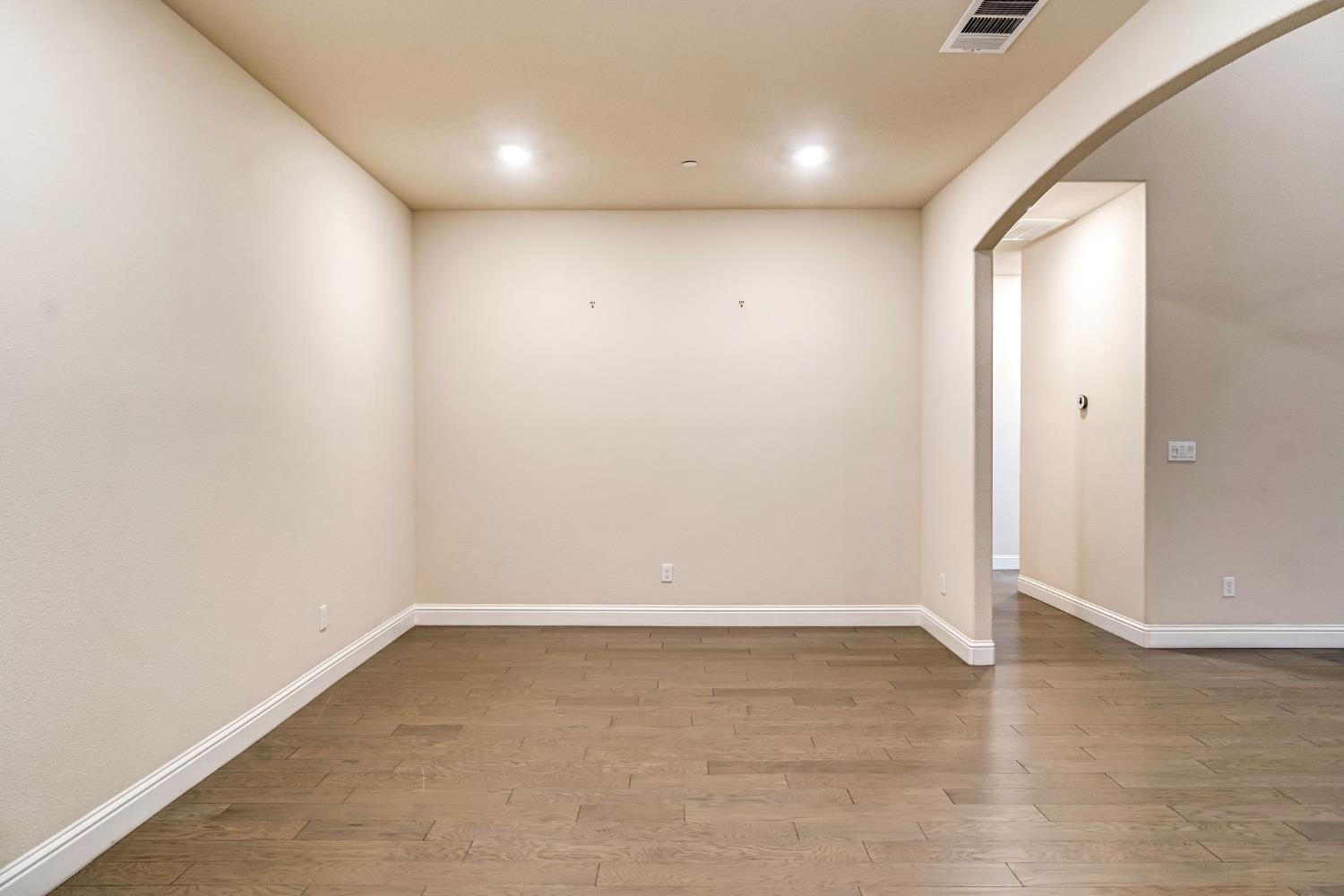 462 Crescent Lane Madera, CA 93636 - Photo 13 of 35 wooden floor in an empty room
