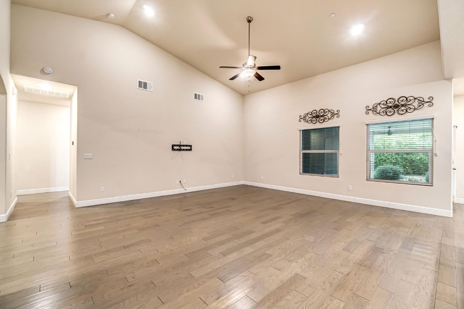 462 Crescent Lane Madera, CA 93636 - Photo 4 of 35 a view of an empty room with a window
