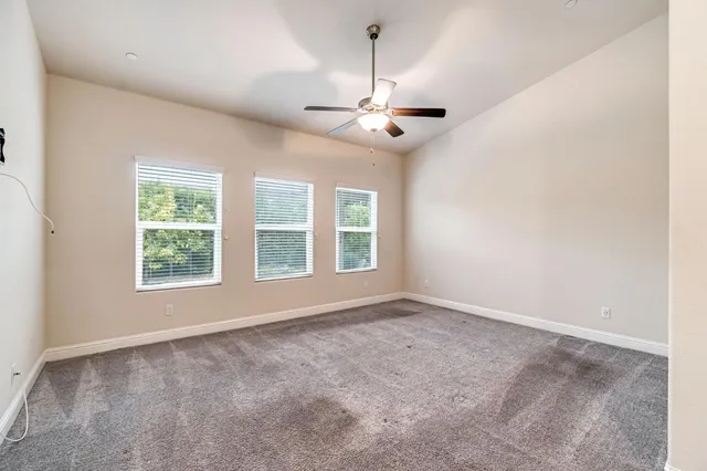 en view of an empty room with a window