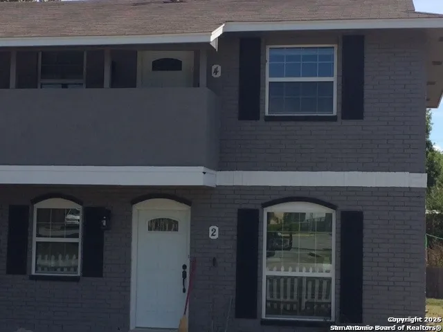 a front view of a house with windows