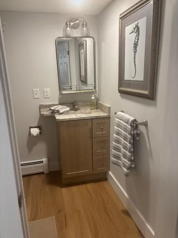 a view of a hallway with washer and dryer